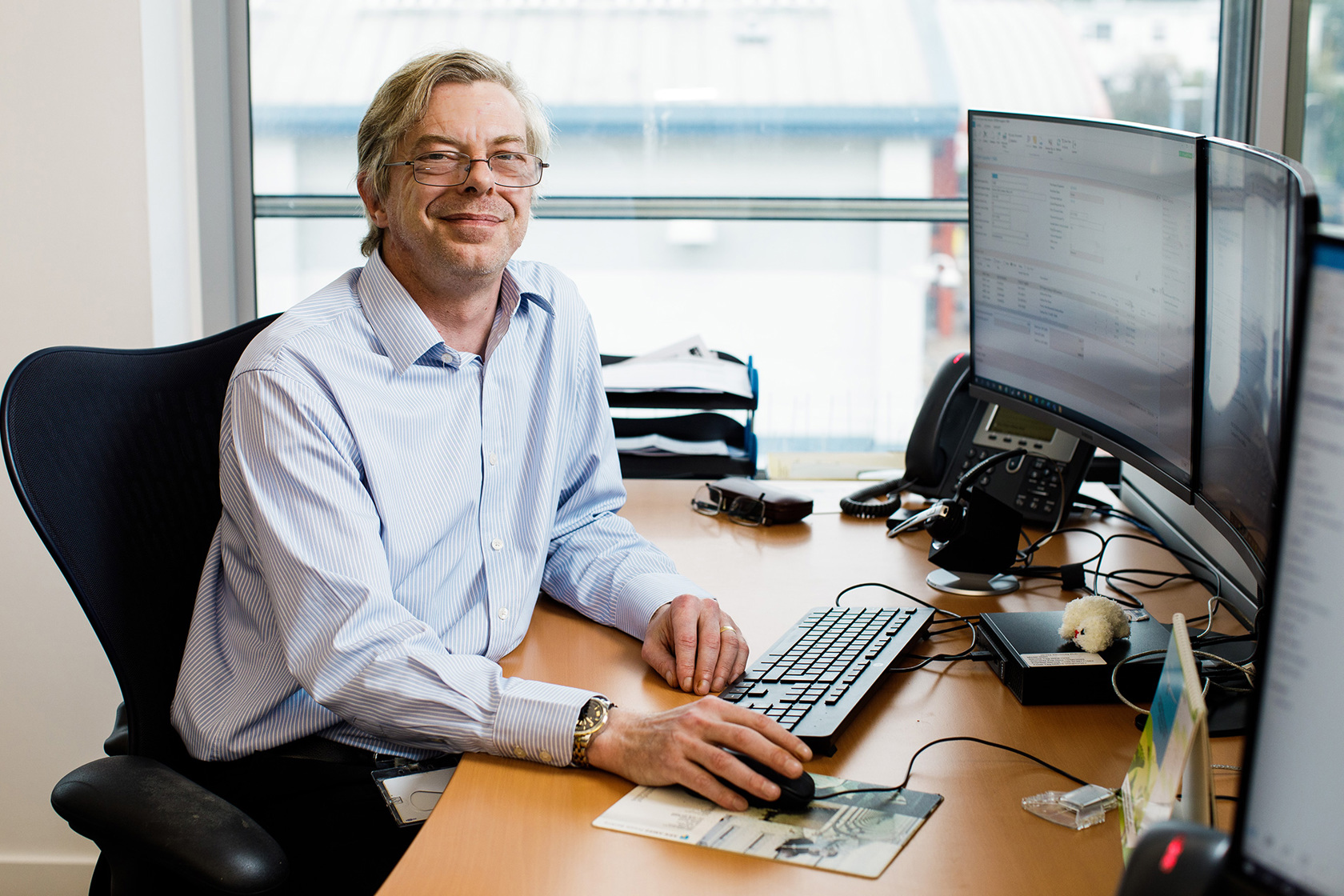 Scott Aldridge is photographed at his desk in the Jersey Electricity Powerhouse offices.