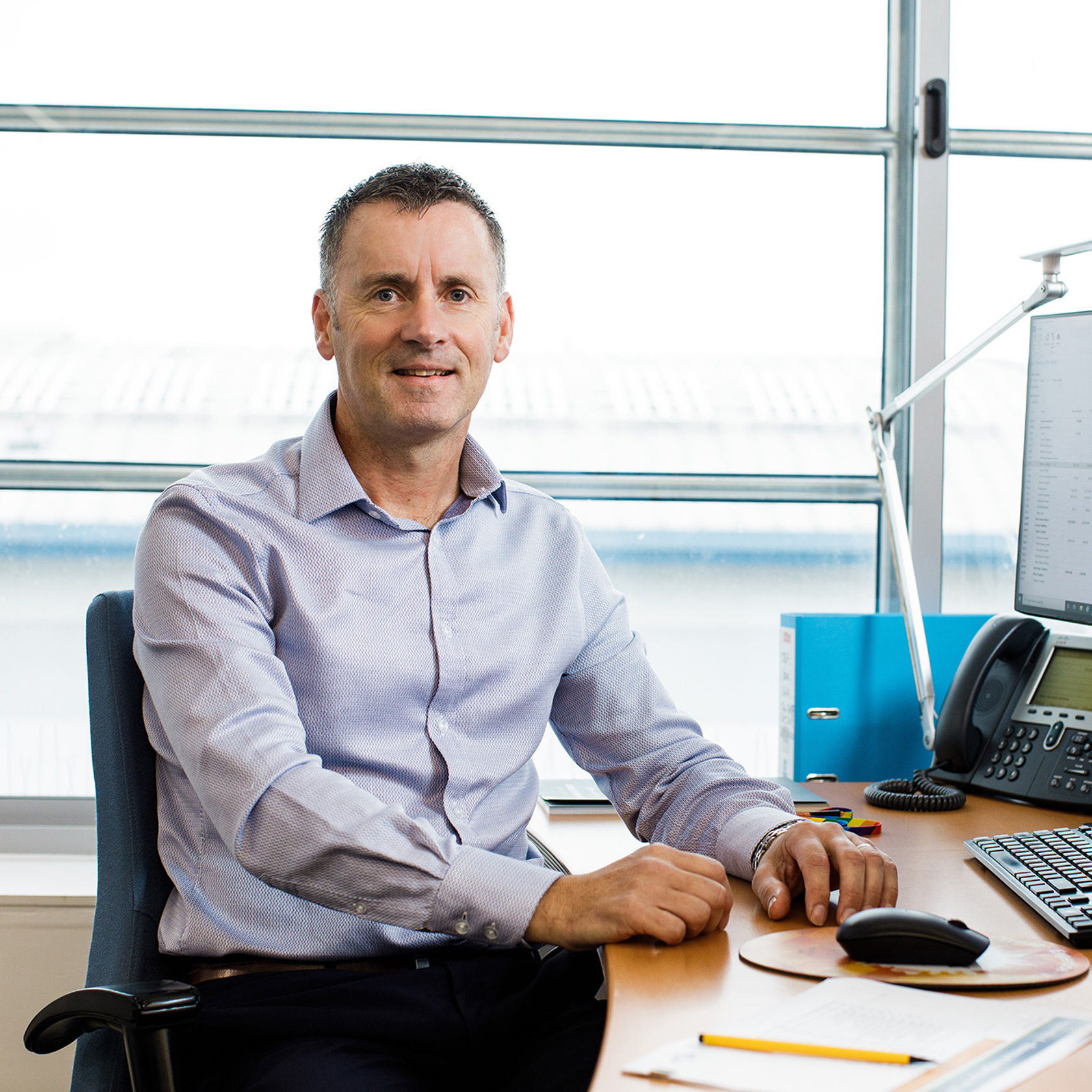 Andy Kemp pictured at his desk at the Jersey Electricty offices at the Powerhouse.