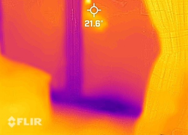 Thermal image from indoors of patio doors with the curtains open