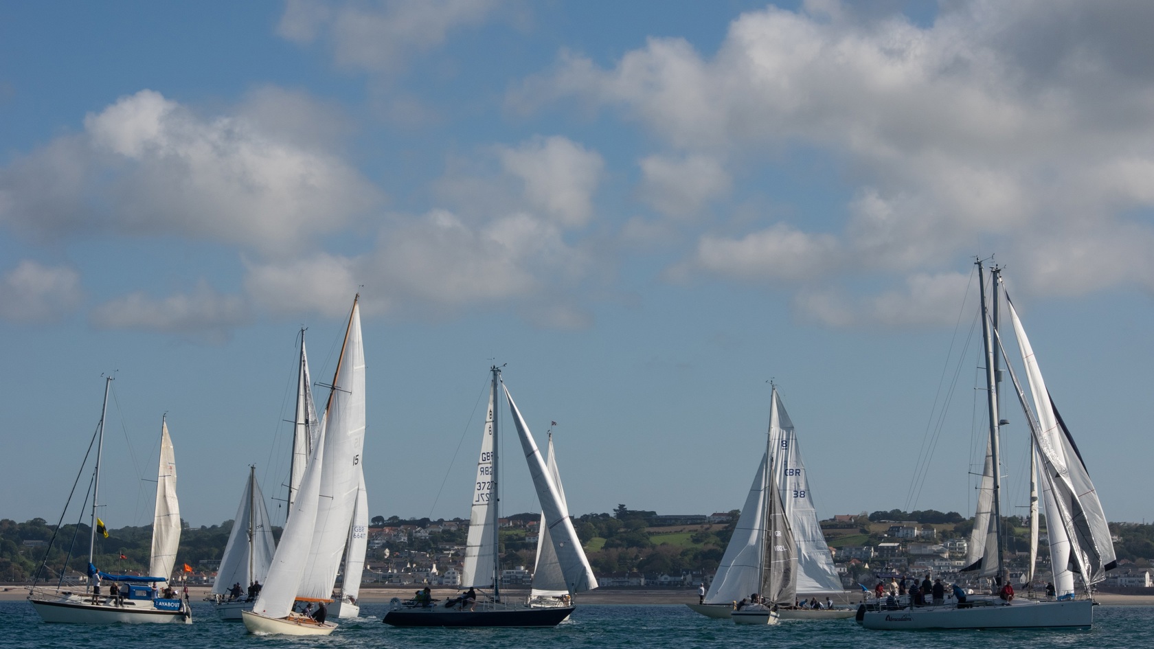 Sailing boats racing close together