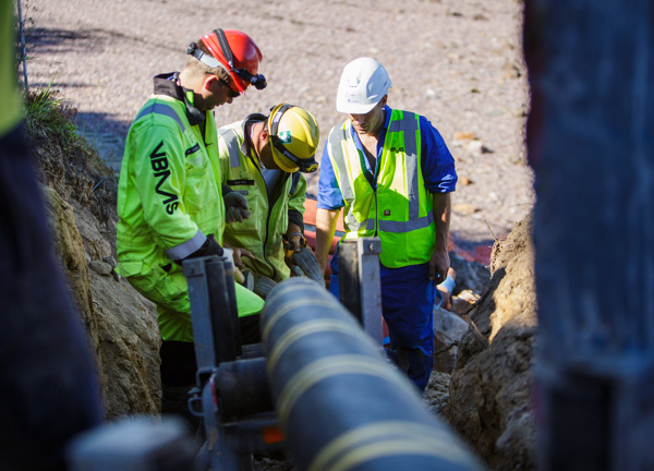 Workmen inspect an undersea power cable