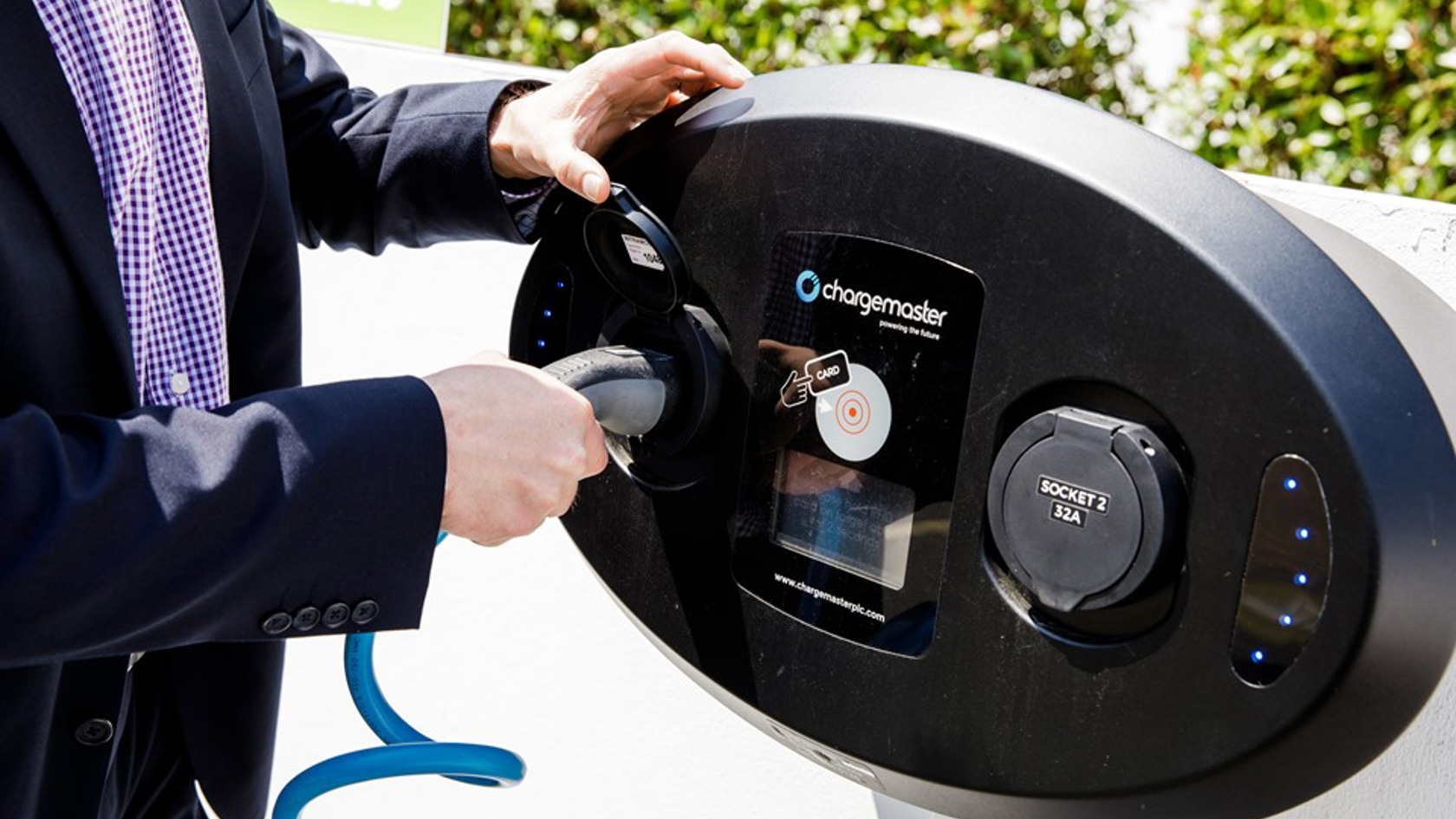 Chris Ambler operating a smart charger