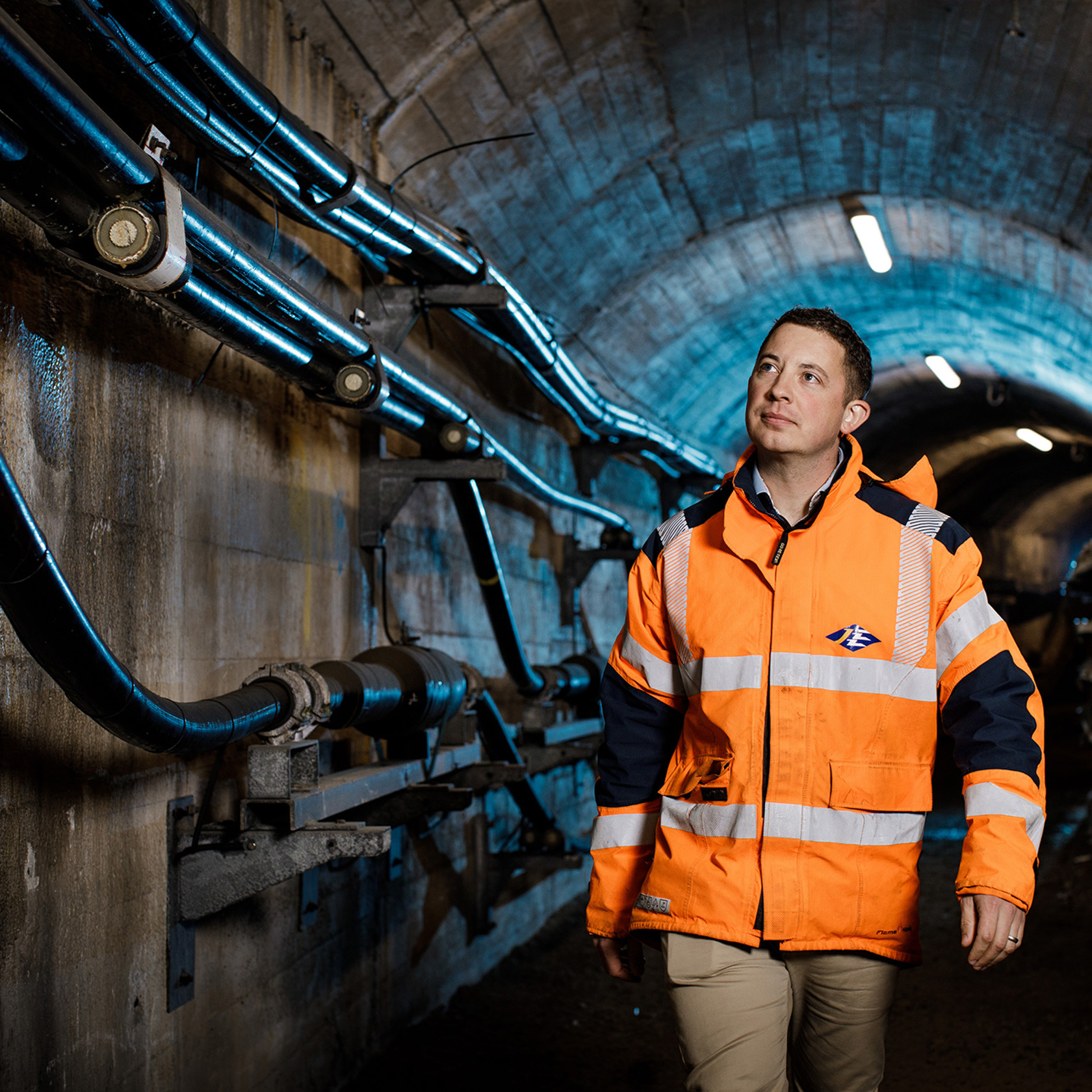 Ashley Mariner, a Jersey Electricity Engineer inspects a series of supply cables.