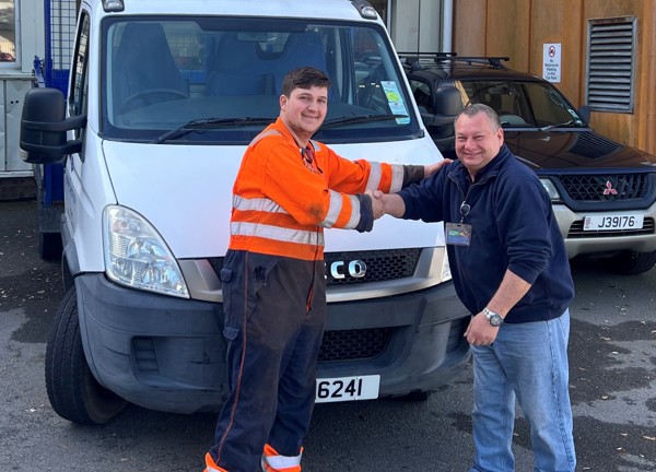 JE Mechanical Craftsperson, Diogo Pereira, shaking hands with Highlands College Workshop technician, John Travert