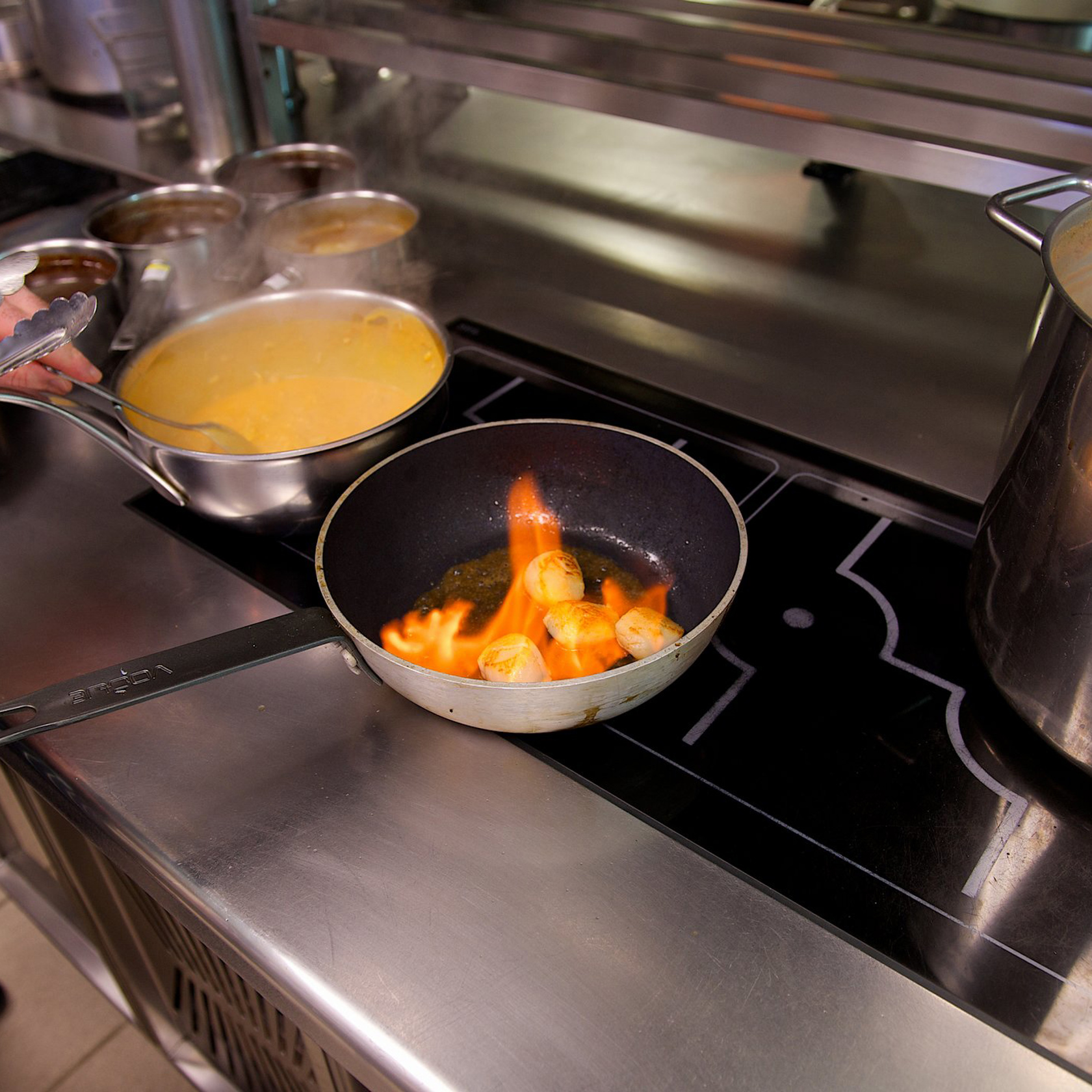 Food cooking on an electric induction hob
