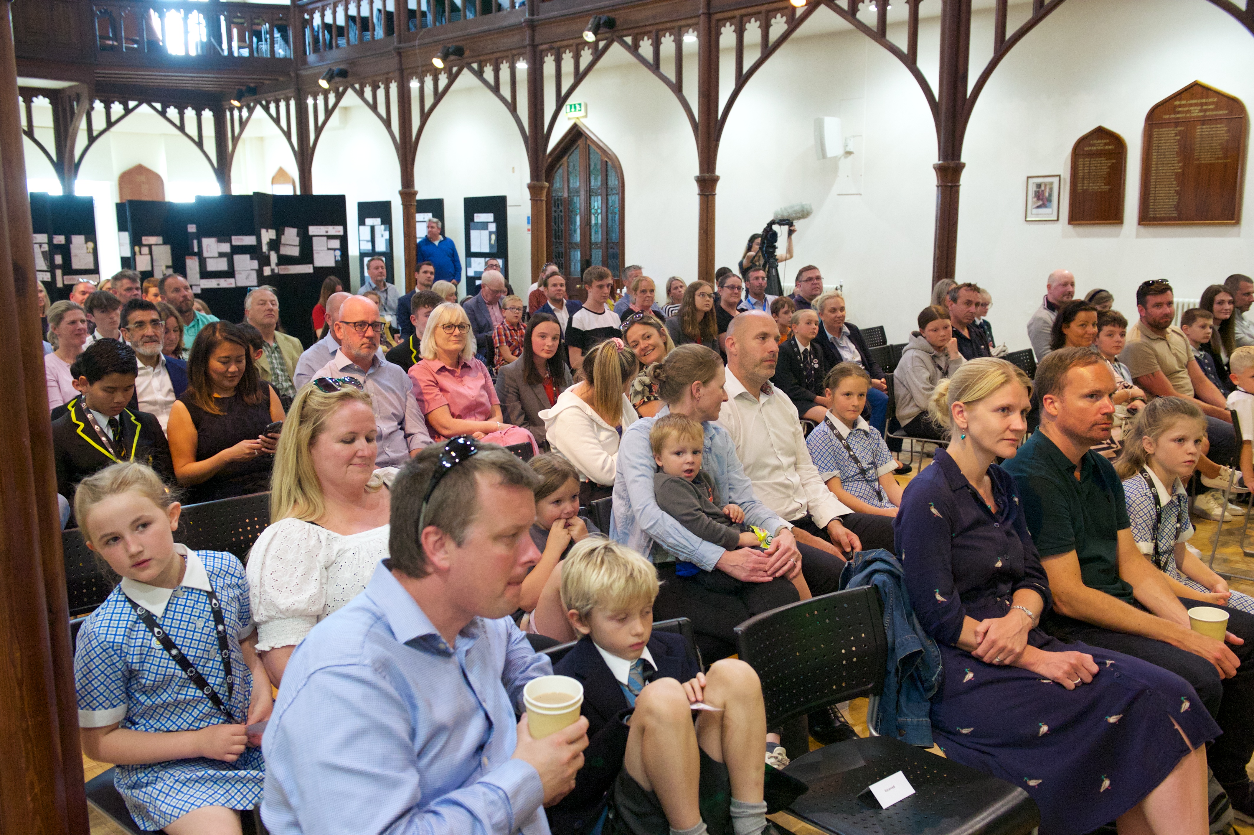 Audience sitting in rows of chairs watching the awards