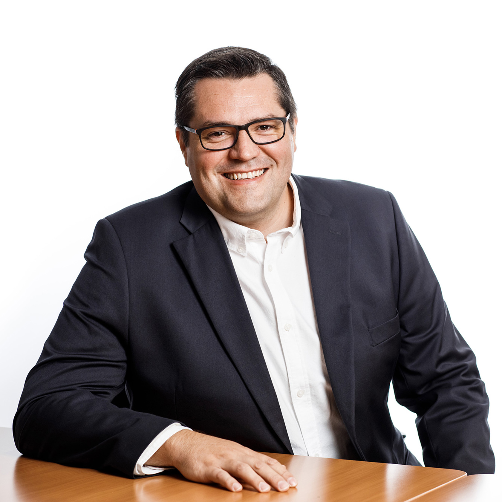 A portrait photograph of Werner Bornman,