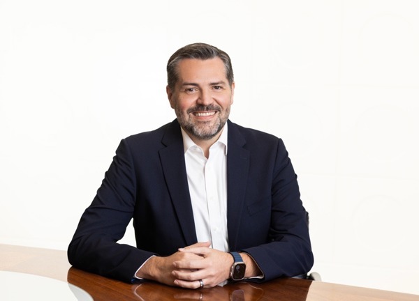 A portrait photograph of Werner Bornman,