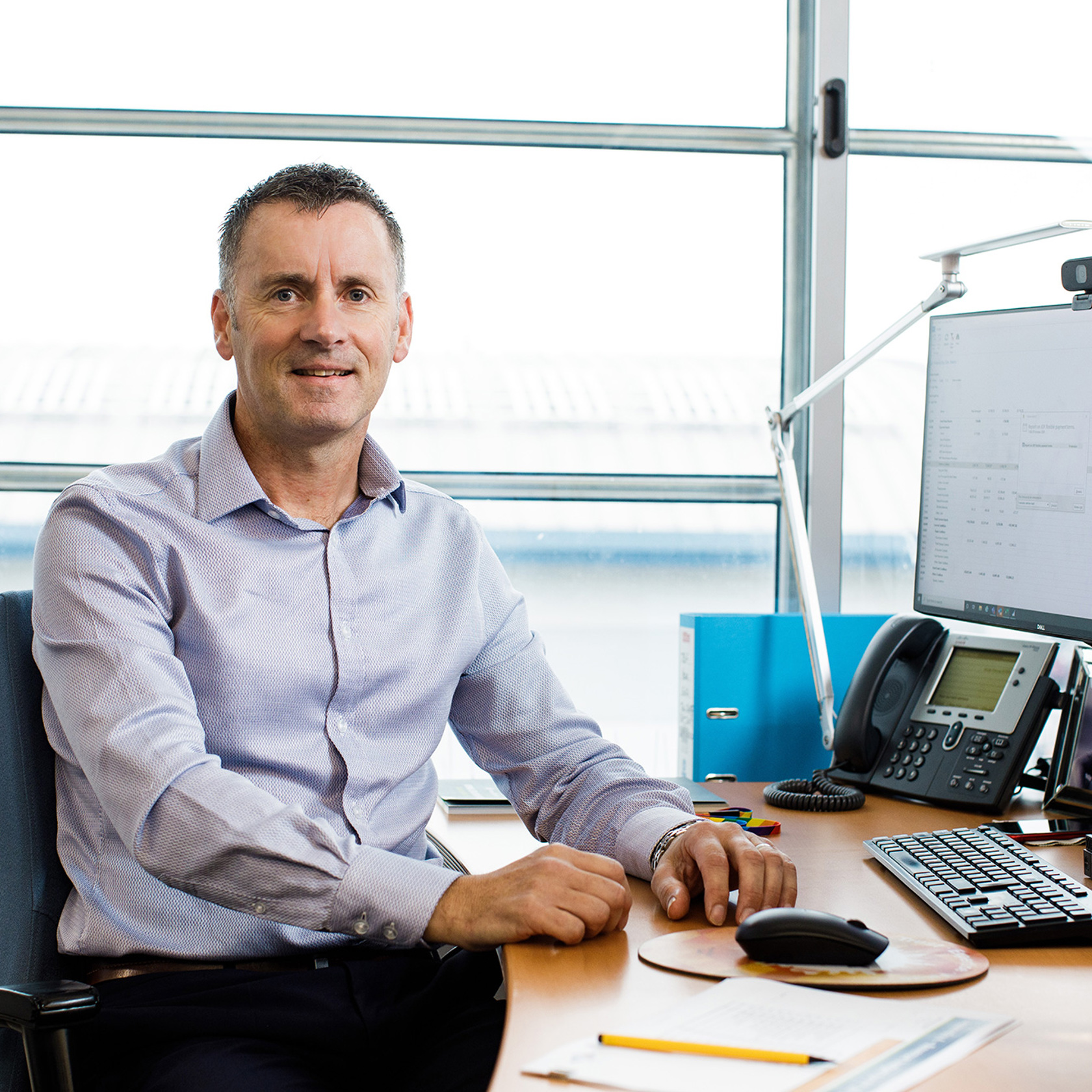 Andy Kemp pictured at his desk at the Jersey Electricty offices at the Powerhouse.