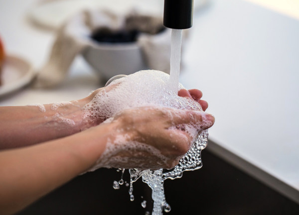 Person washing their hands