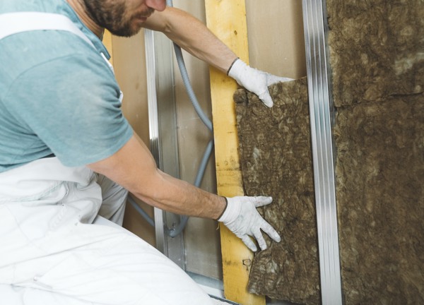 Man installs cavity wall insulation