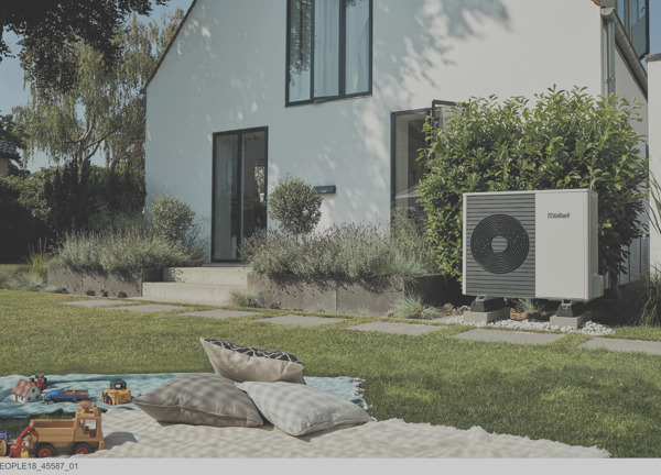 Ground source heat pump outside a modern home