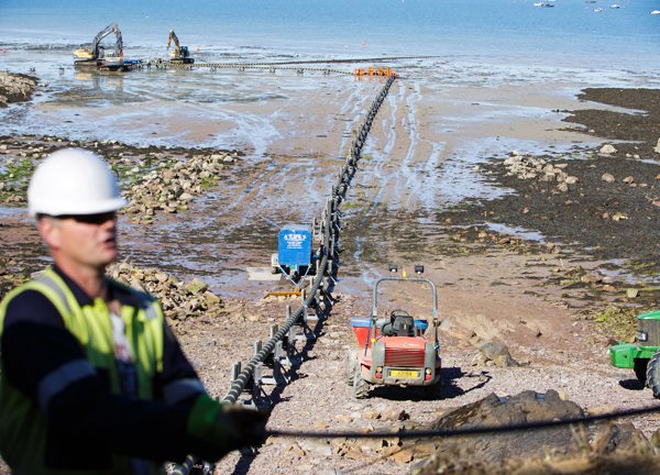 Normandie 1, a subsea electric cable is laid out across a beach ready to be buried.