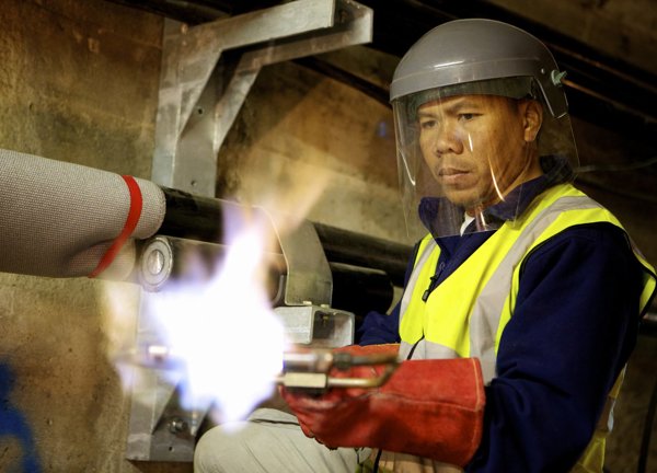 An engineer works on the South Hill Switching Station project.