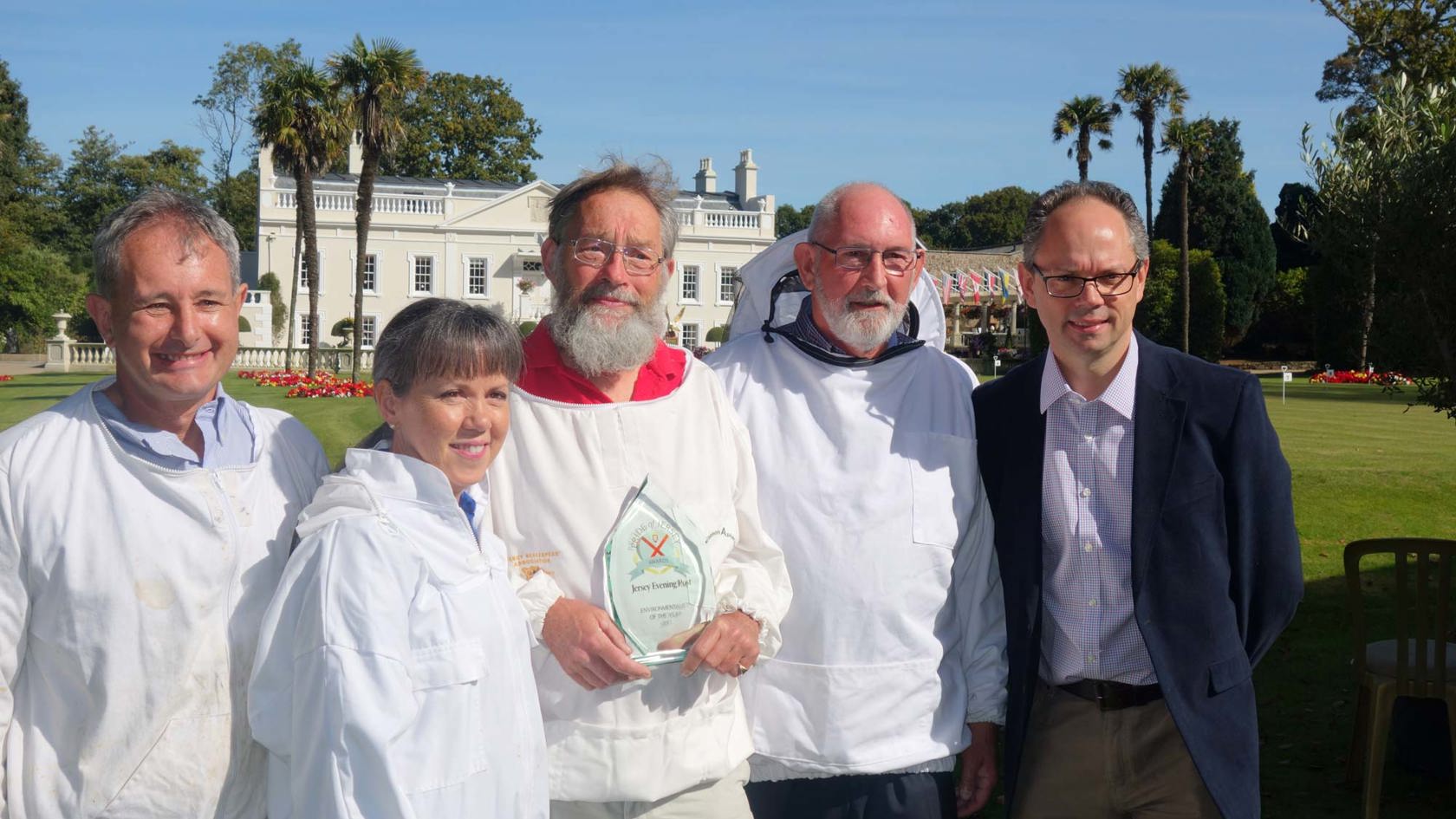 Chris Ambler with beekeepers
