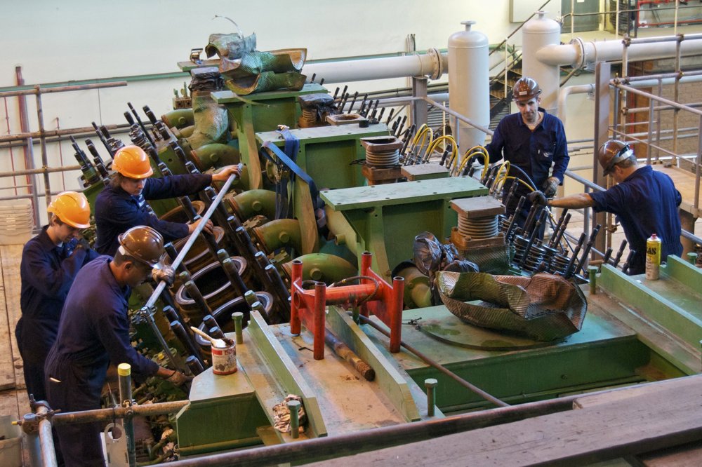 Engineers install a diesel generator at La Collette Power Station.