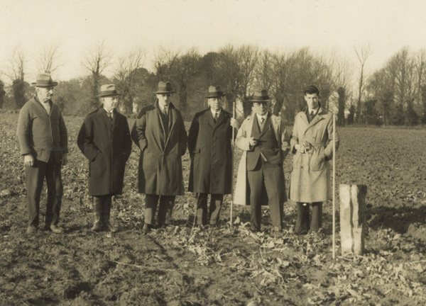 Jersey Electricity executives stand next to the boundary stone that marks the site the Powerhouse now stands on.