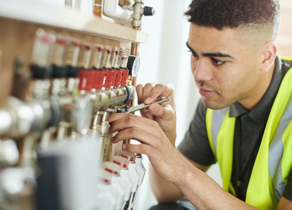 Man installs heating system
