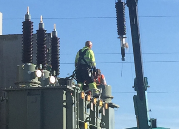 Crane moves regulators into place