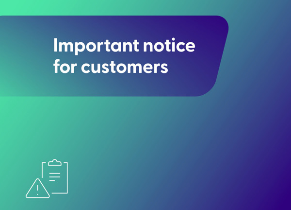 A utility worker wearing bright orange safety gear is climbing a wooden pole to repair lines, with leafless tree branches and a clear blue sky in the background.