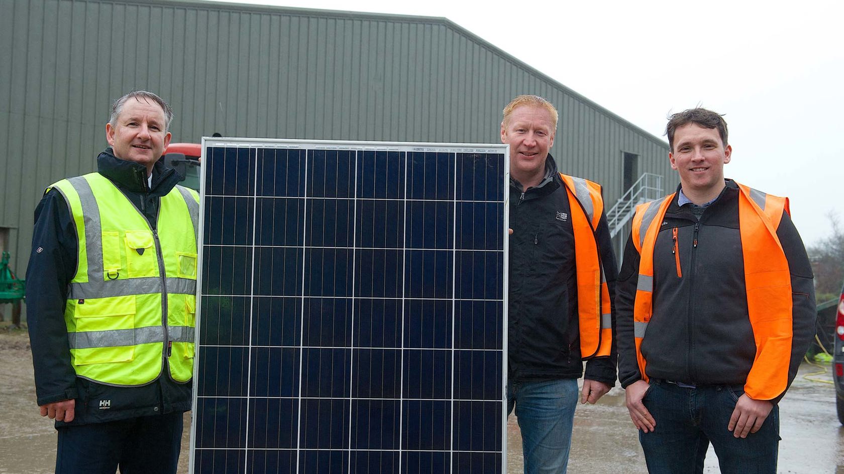 Peter Cadiou and team with solar panel