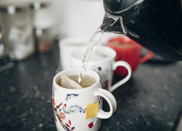 Pouring two cups of tea