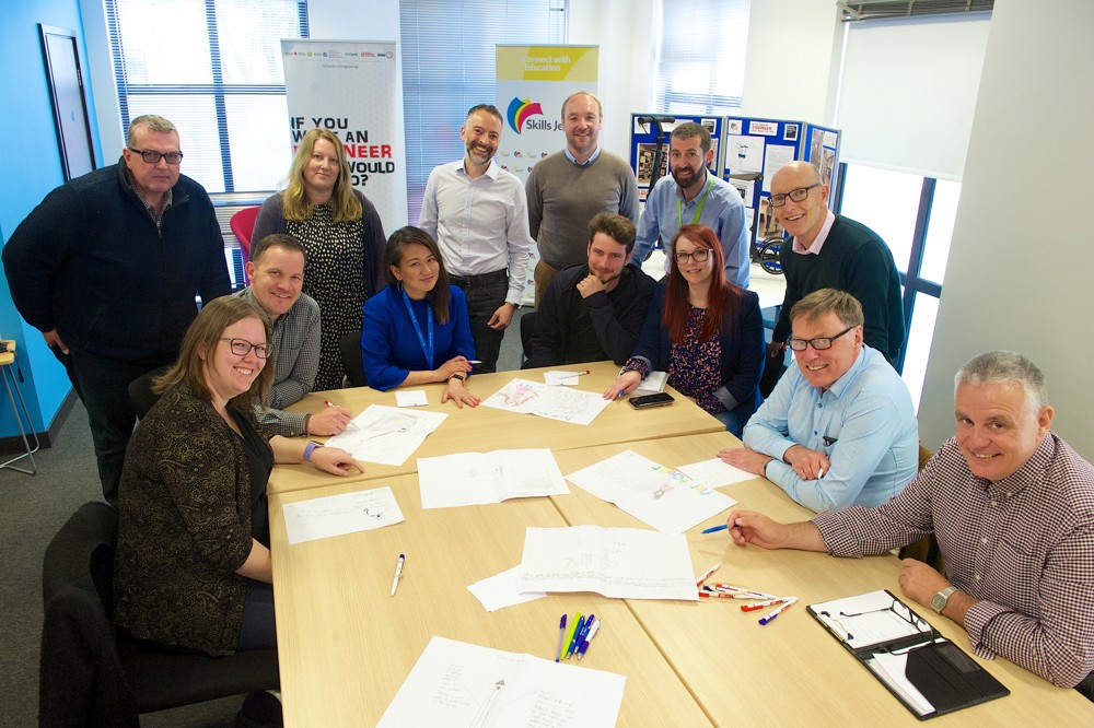 The Primary Engineer Awards 2022 judges sat around a large table reviewing the hundreds of entries