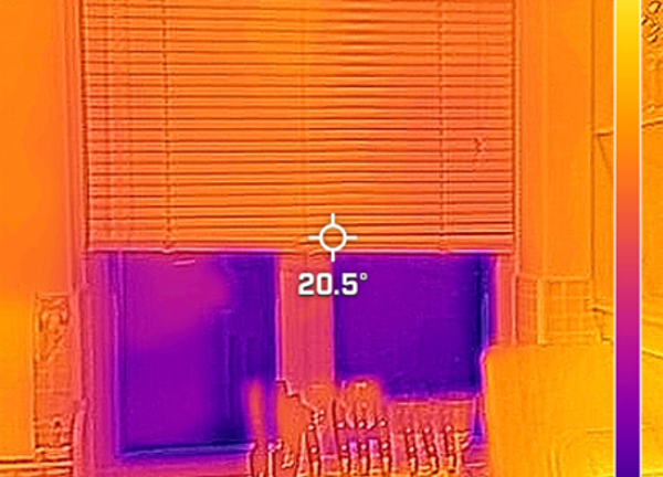 Thermal image of a kitchen window with the blind pulled halfway down