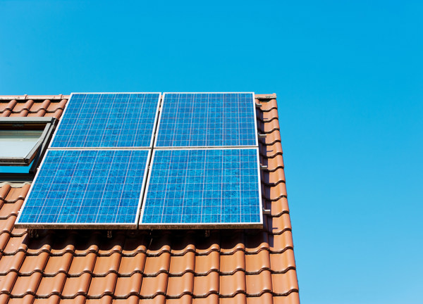 Four solar panels on a roof